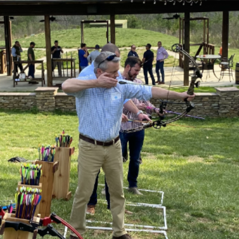 Technology leader lining up his arrow, ready to shoot at target
