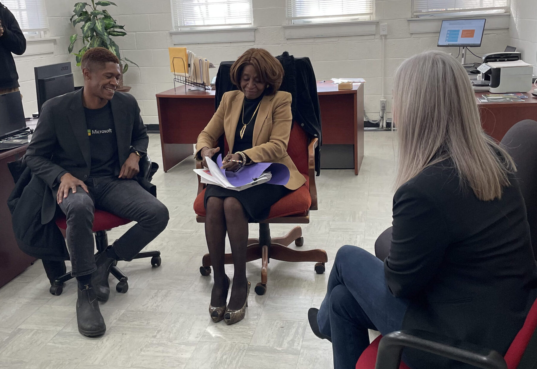 Executive Director of OMITT Innovative Solutions, Rose-Jones Edwards, reflects on technology transformation OMITT has undergone with Apparo, showing JJ the Maturity Model assessment.